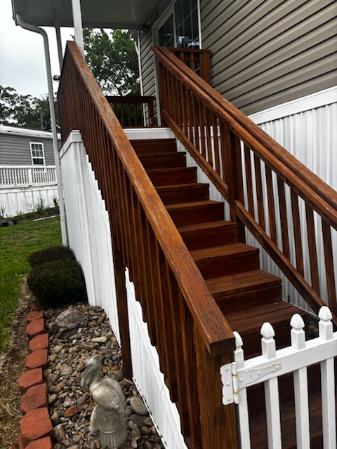 Deck with fresh white railings after remodel